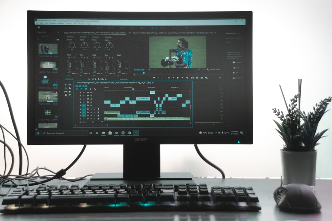 video editor working on computer