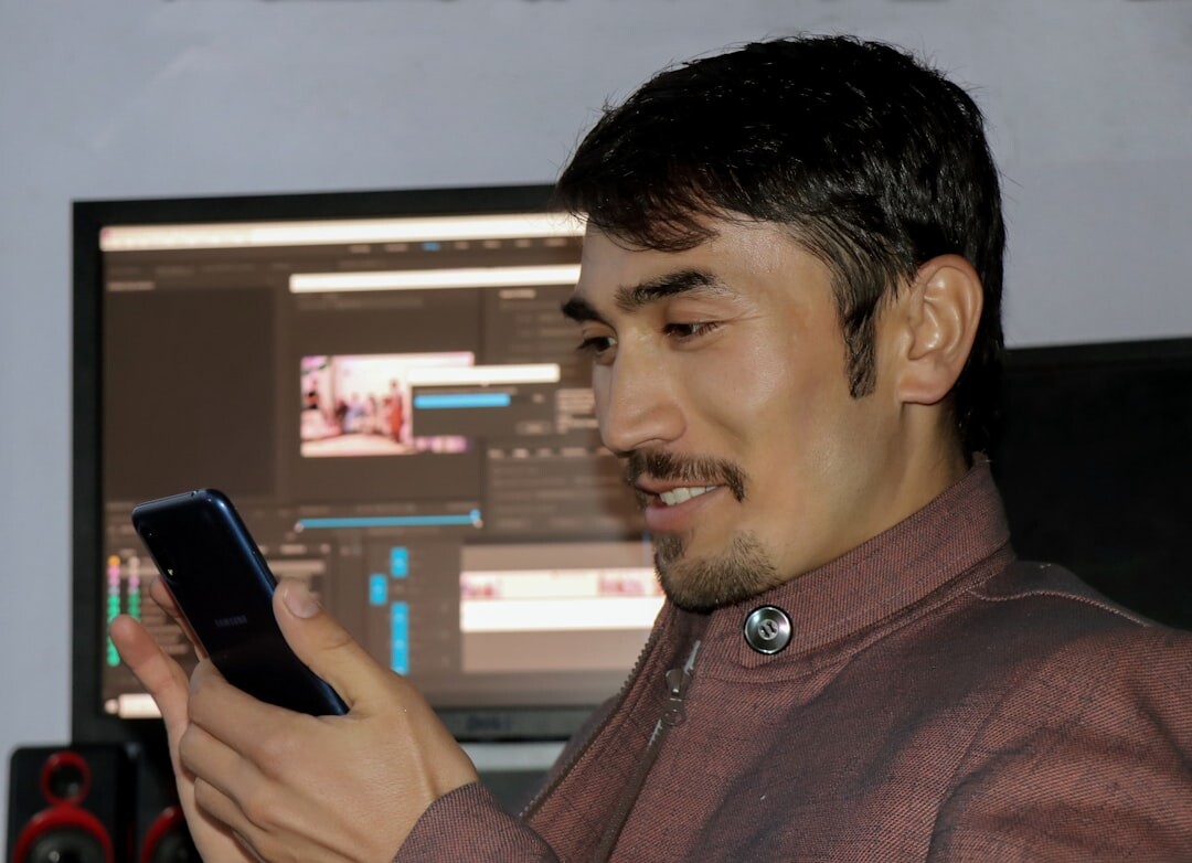 professional video editor at computer